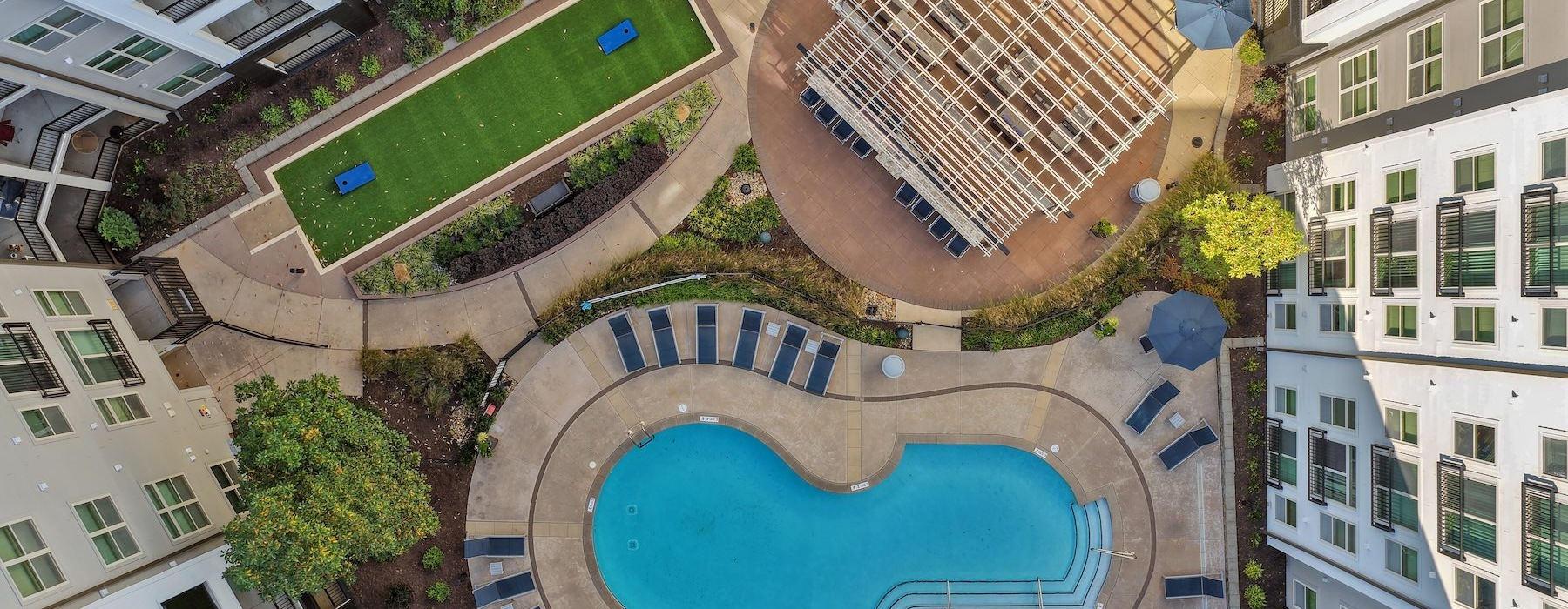 a large courtyard with buildings around it