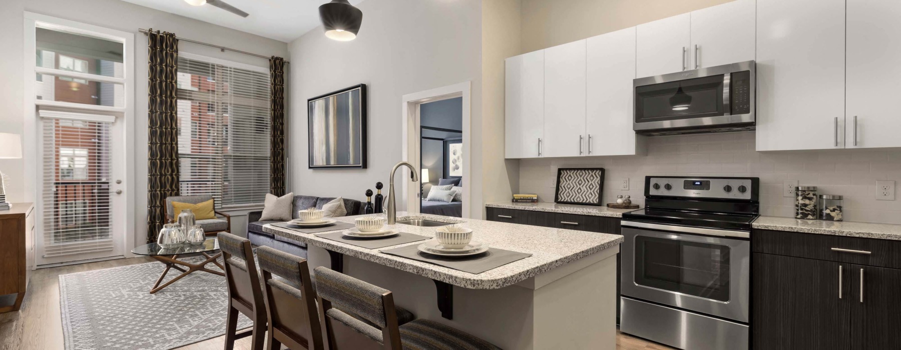 a kitchen with white cabinets