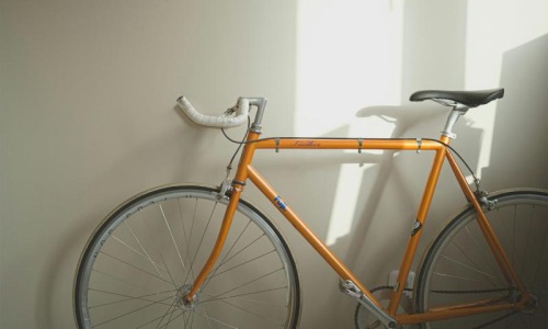 a bicycle parked in a room